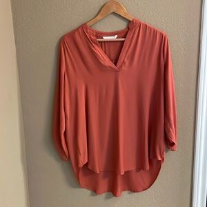 Lush burnt orange L blouse long sleeves w/ dark silver button sleeve cuff holder